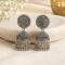 WhatsApp Image 2026-08-26 at 14.39.08 Silver Oxidised Circular/Chakra Statement Jhumkas
